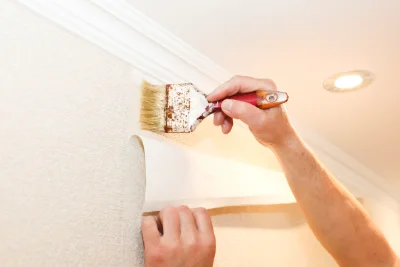Pose de papier peint à Burnand — revêtements muraux et toiles de verre